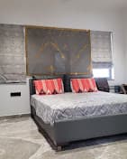 Warm bedroom interior featuring premium surfaces